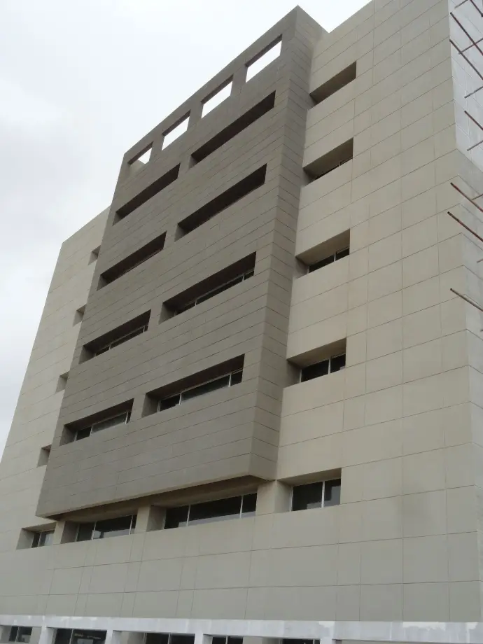 CemTrox over Indus Hospital Cemtrox on a hospital building. The fairface concrete grey and dark grey colors are used.