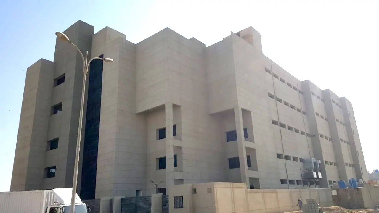 A large industrial building coated with CemTrox in 2018. Building is situated near the sea, and it is still maintenance free after 6 years. 